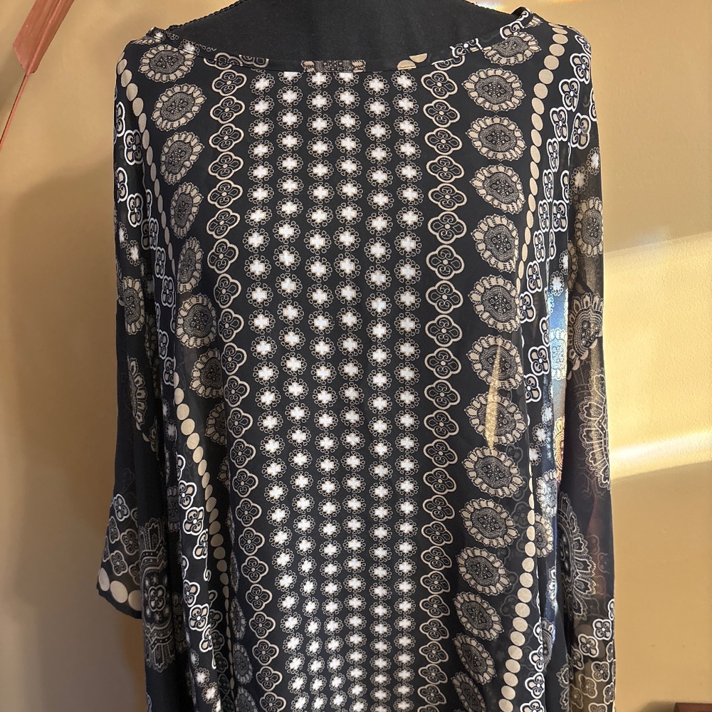 Women’s poncho-like top